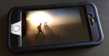 Looking back at Burning Man 2016 with phone in Evo Tactical XT iPhone protective case