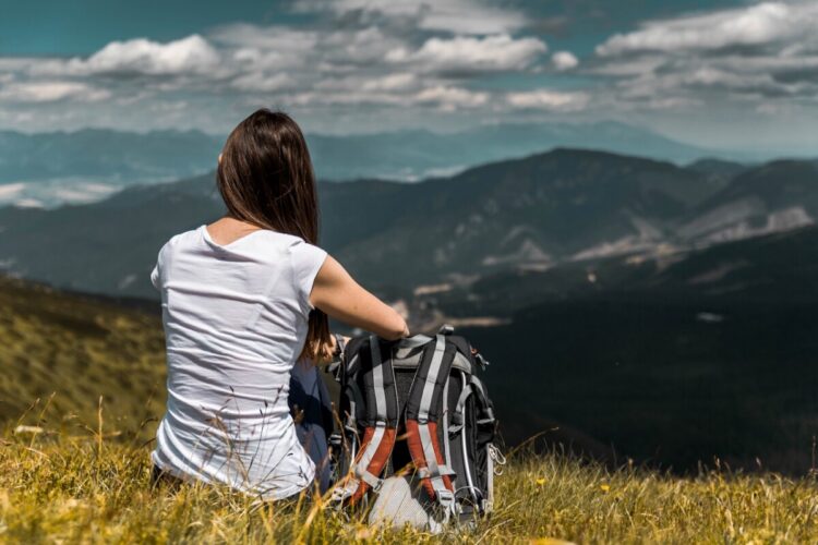 Backpacker on hill, image image Jan Vašek